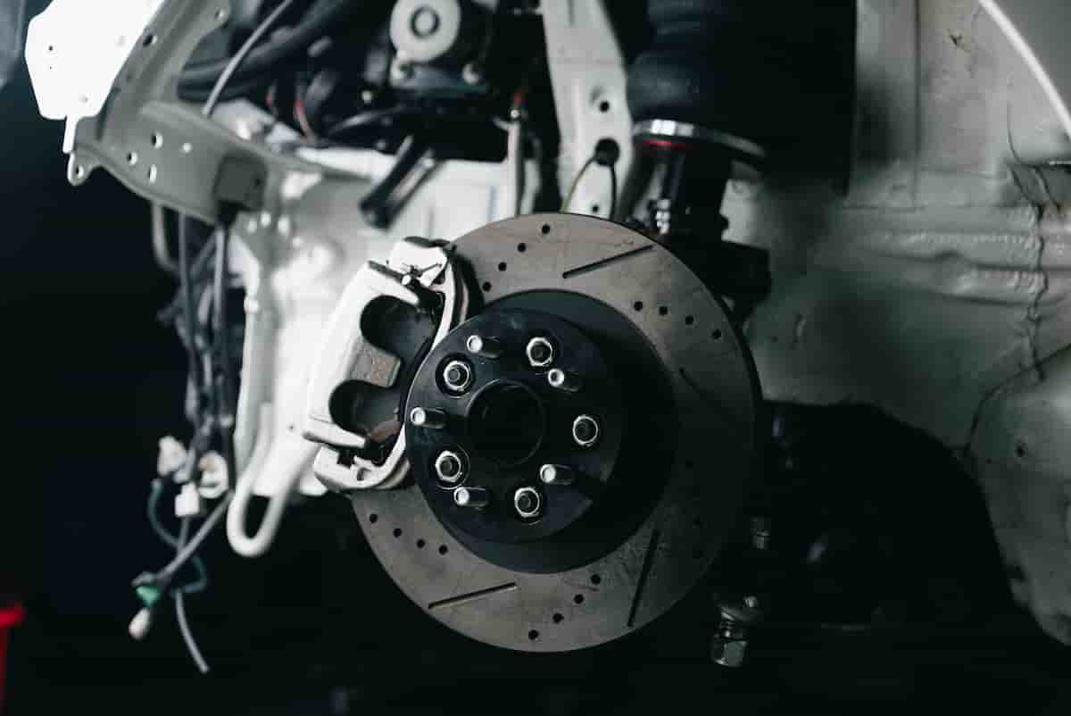 Brake pad and rotor replacement in a Manhattan Kansas driveway